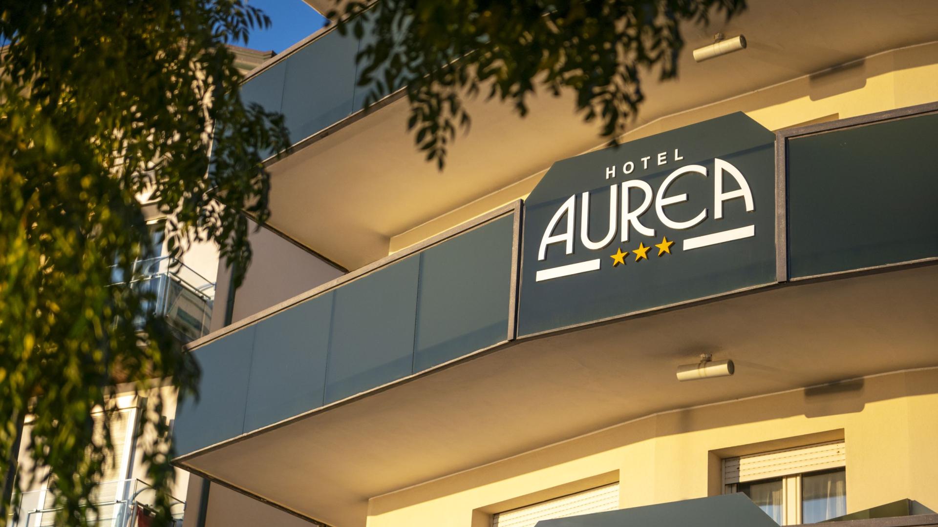 Hotel Aurea with three stars, modern design and elegant balconies.